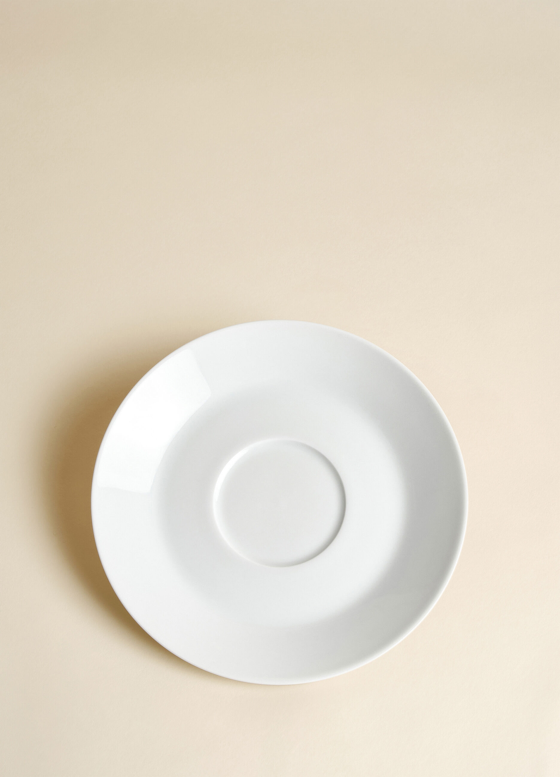 Piatto piano Ambiente in porcellana