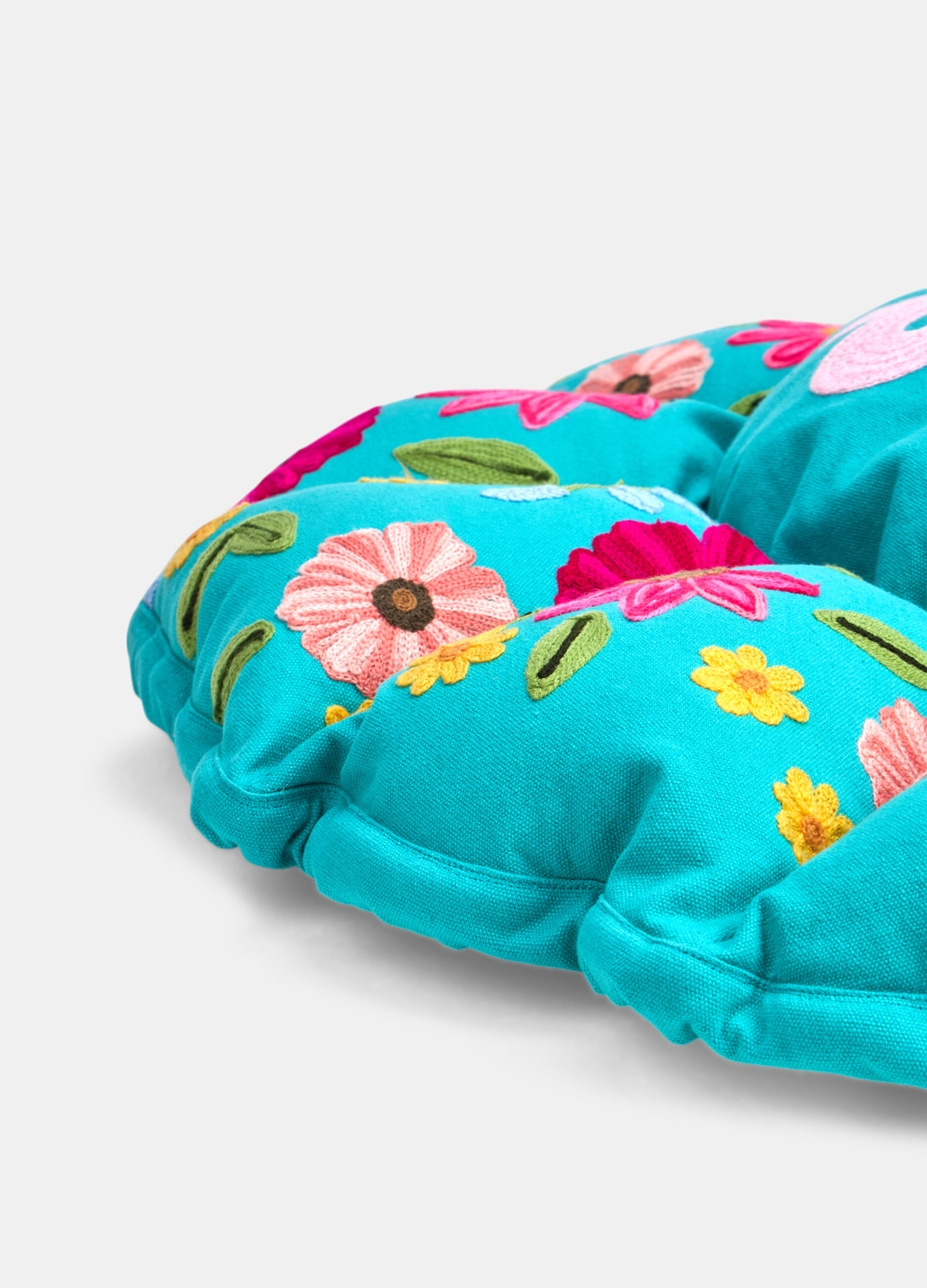 Round padded cushion with multicoloured embroidery_1