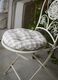 Round seat pad in quilted check._0