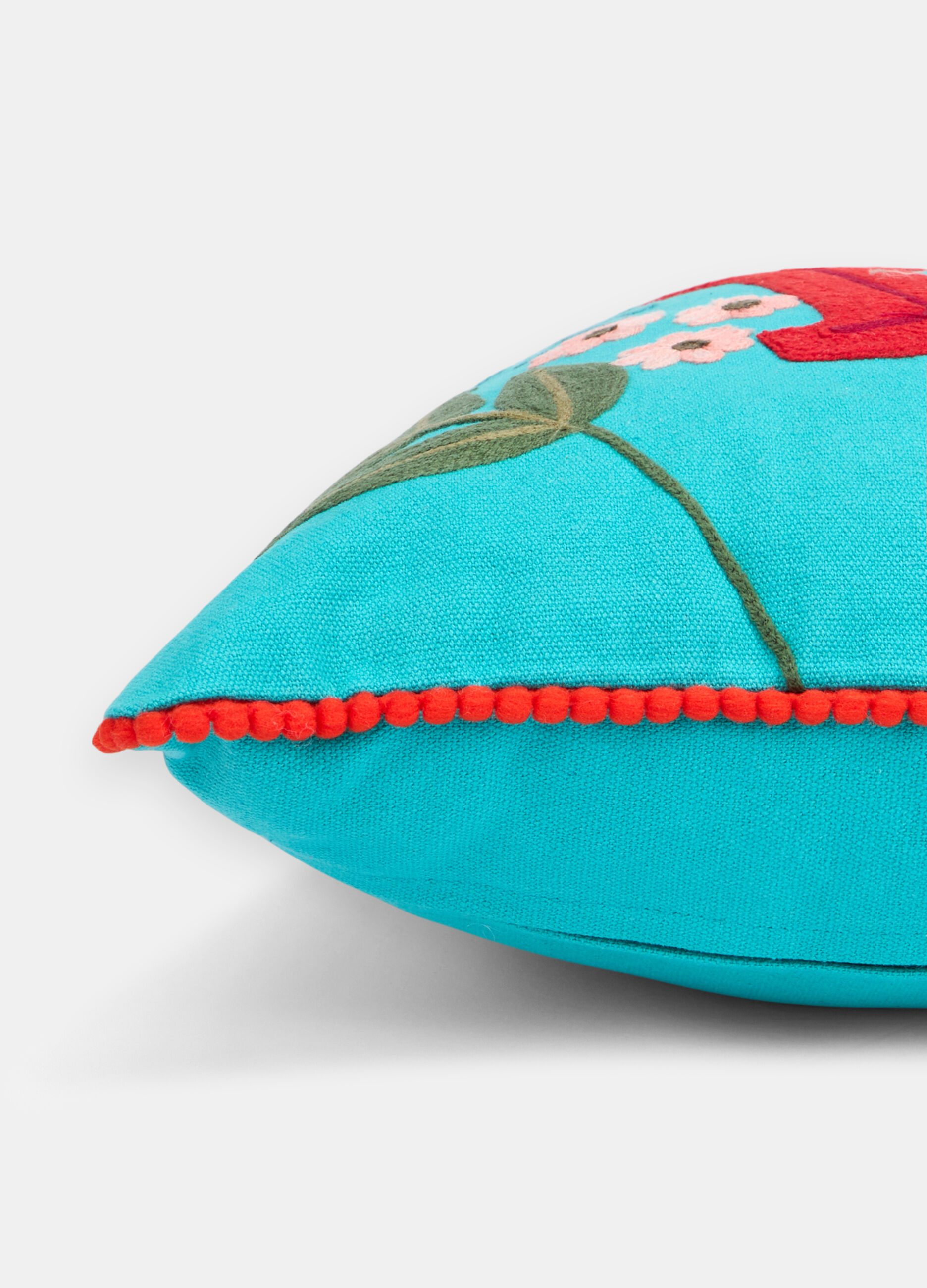 Padded cushion with multicoloured embroidery_1