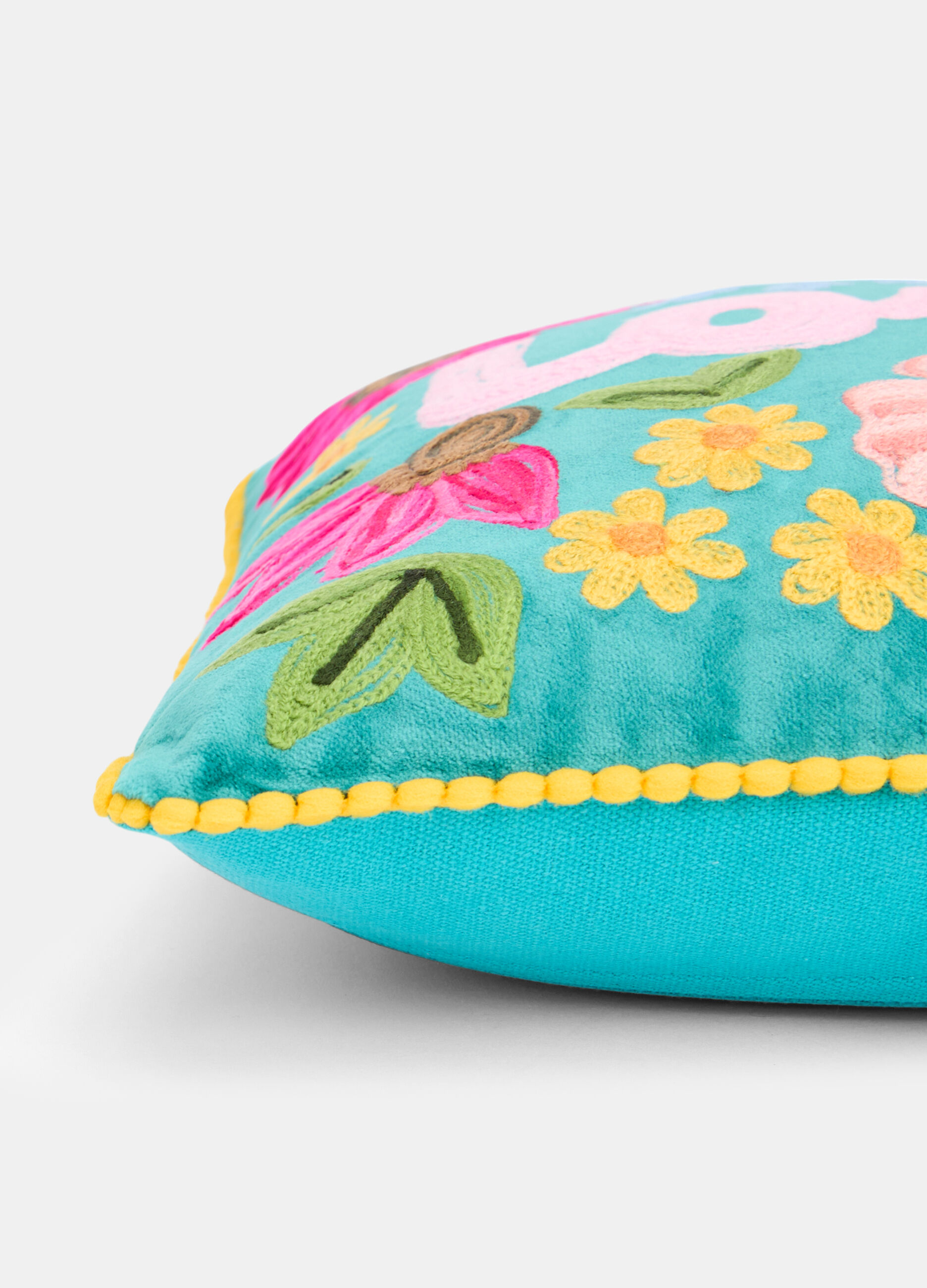 Padded cushion with multicoloured embroidery_1